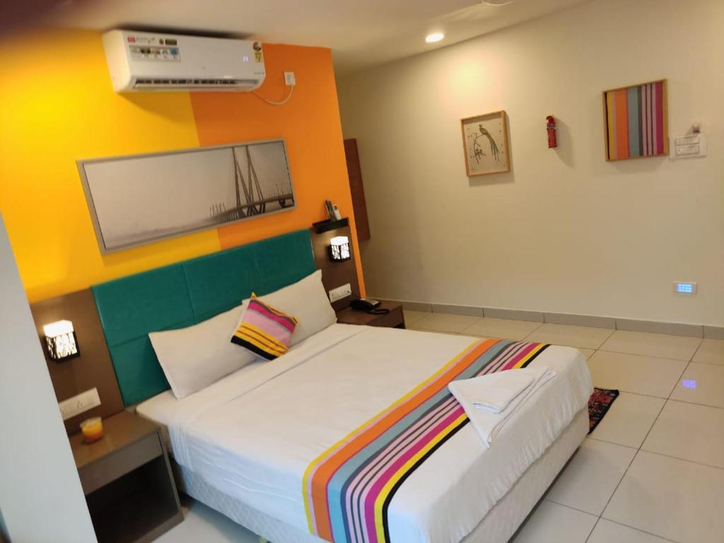 Postel nebo postele na pokoji v ubytování Hotel White Fields Hitec City, Hyderabad