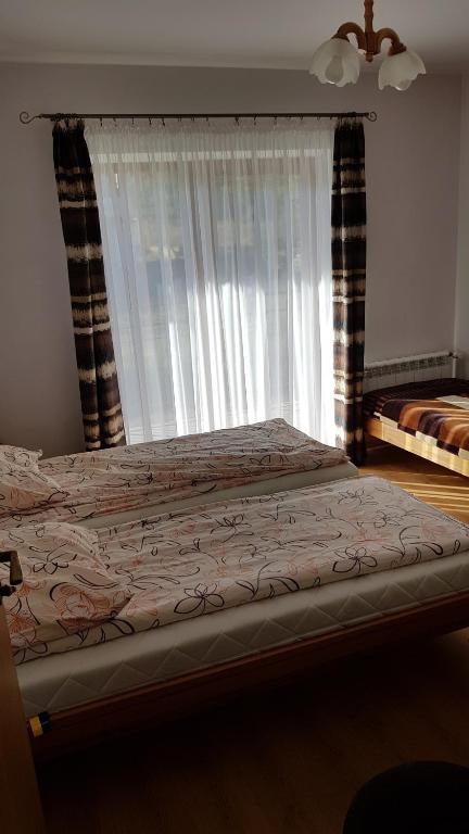 Posteľ alebo postele v izbe v ubytovaní Pokoje Pod Kopiencem Grzegorz Plata