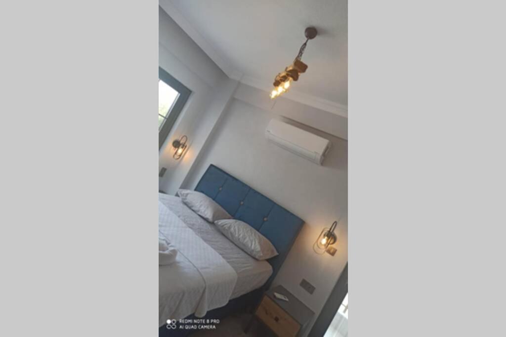 Postel nebo postele na pokoji v ubytování Villa ERTUNÇ - Kaliteli Tatilin Adresi