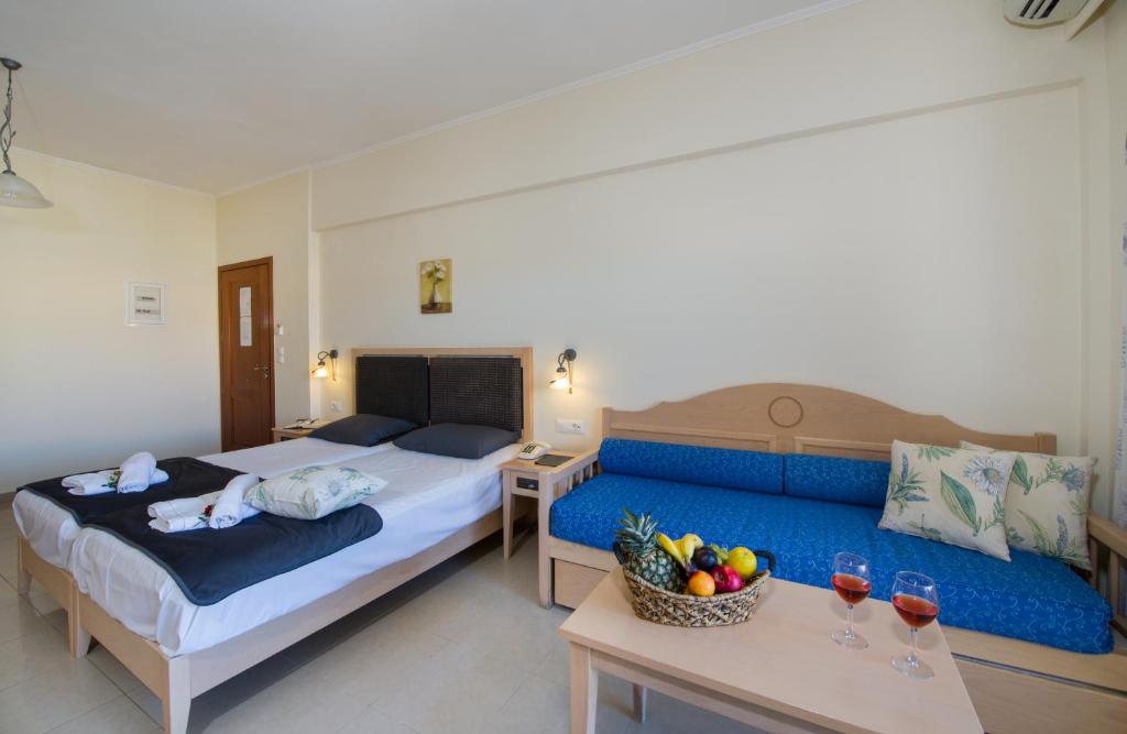 Postel nebo postele na pokoji v ubytování Toxo Hotel