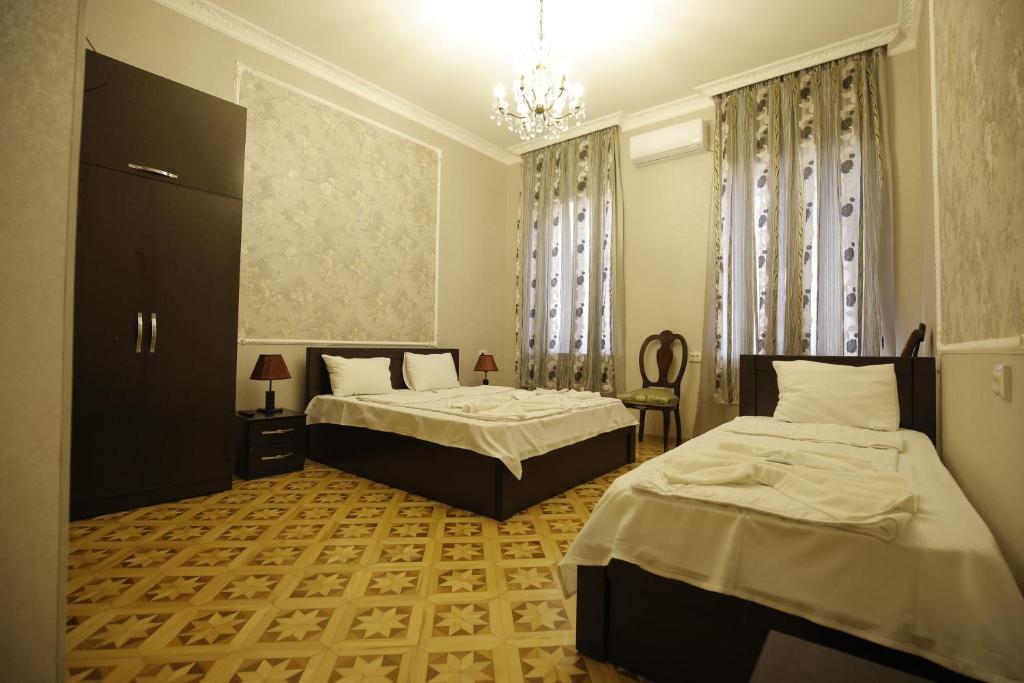 Postel nebo postele na pokoji v ubytování HOTEL COMFORT