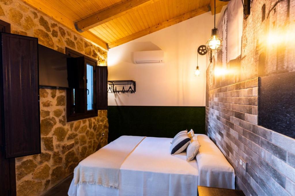 Postel nebo postele na pokoji v ubytování Apartamentos turísticos MAJMA