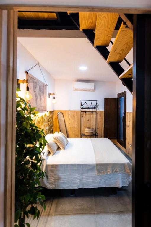 Postel nebo postele na pokoji v ubytování Apartamentos turísticos MAJMA