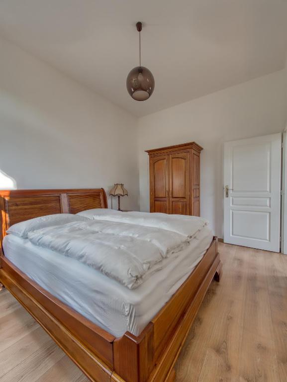 Postel nebo postele na pokoji v ubytování Apartmány Klášterní 84