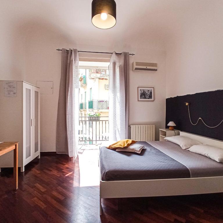 Postel nebo postele na pokoji v ubytování B&B Bandiera 77