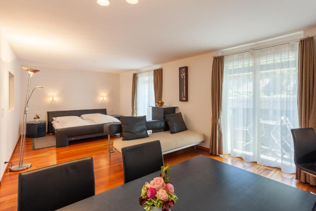 Postel nebo postele na pokoji v ubytování Weisses Rössli Swiss Quality Hotel