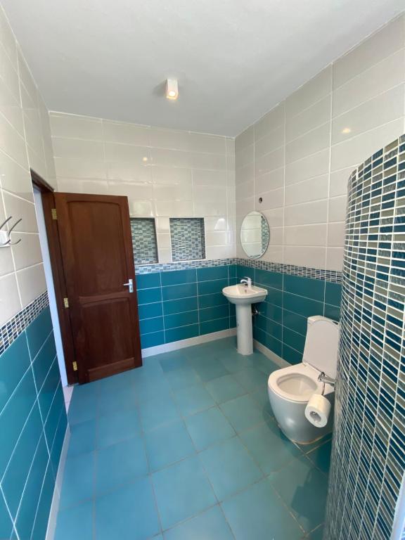 Koupelna v ubytování MASKANI Villa