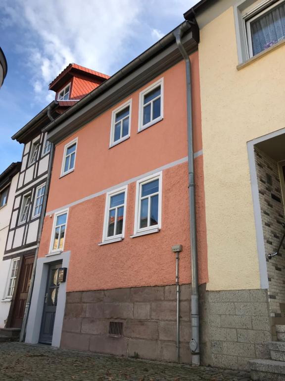 a building with a clock tower on top of it at Ferienwohnung Bad Frankenhausen in Bad Frankenhausen