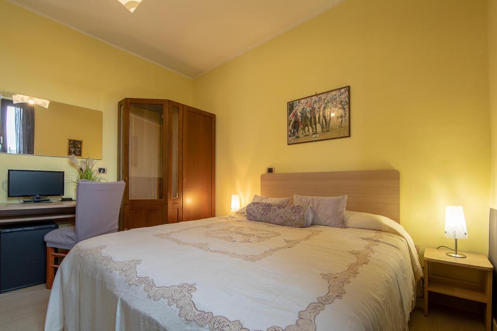 Postel nebo postele na pokoji v ubytování La Valle B&B