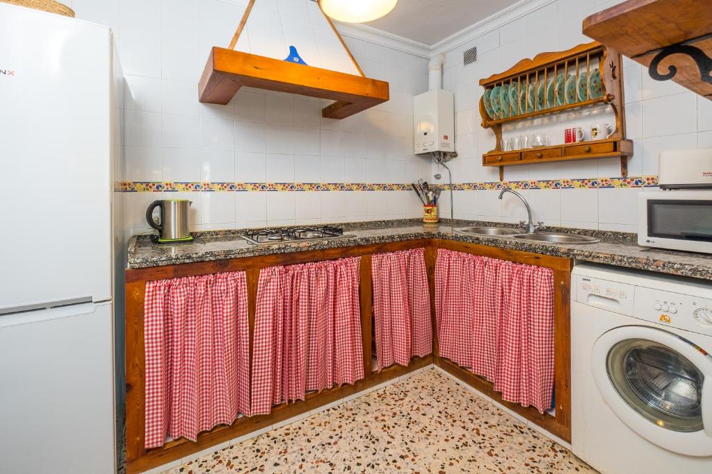 Kuchyň nebo kuchyňský kout v ubytování Casa de María