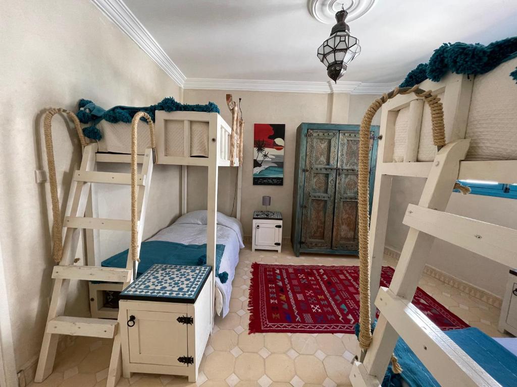 Postel nebo postele na pokoji v ubytování Taghazout Ocean View