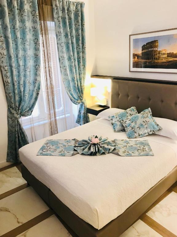 Posteľ alebo postele v izbe v ubytovaní KAMBAL LUXURY SUITES