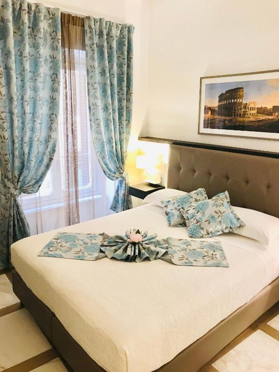 Posteľ alebo postele v izbe v ubytovaní KAMBAL LUXURY SUITES