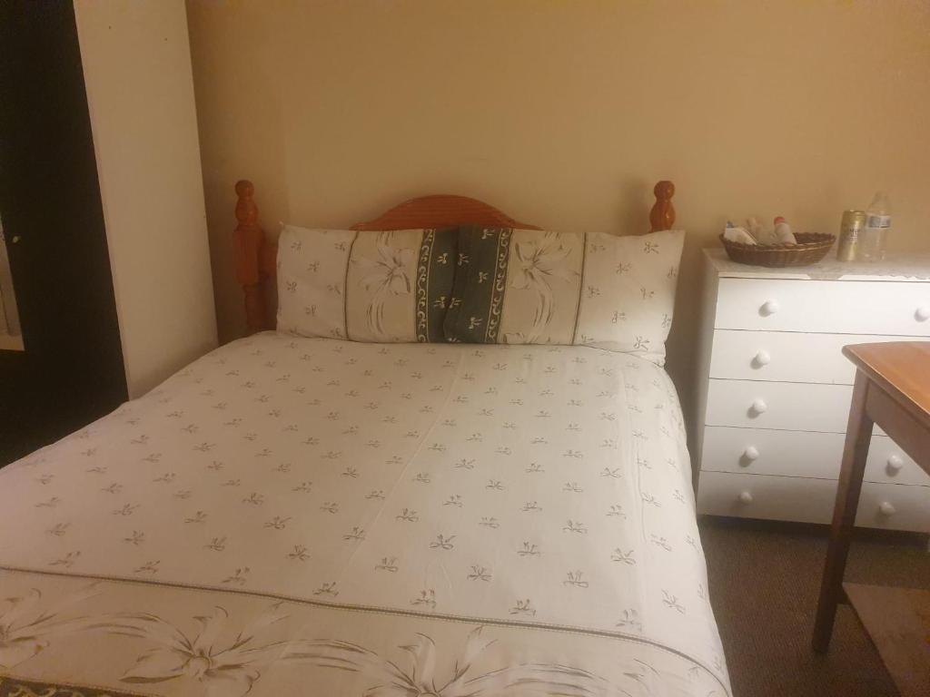 Ένα ή περισσότερα κρεβάτια σε δωμάτιο στο Bournebrook Eltham
