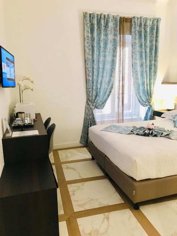 Posteľ alebo postele v izbe v ubytovaní KAMBAL LUXURY SUITES