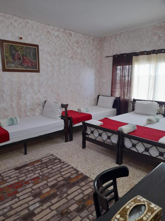 Postel nebo postele na pokoji v ubytování Magtas Hotel