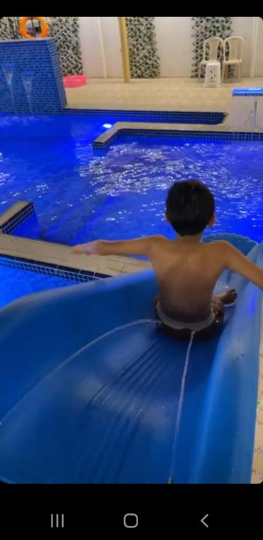 Bazén v ubytování Aljood Resort nebo v jeho okolí
