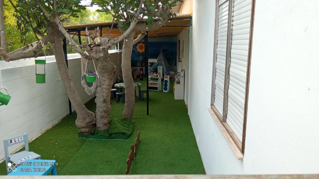 Vonkajšia záhrada v ubytovaní Casa de sueños Benasha con piscina, zona infantil y parking privado