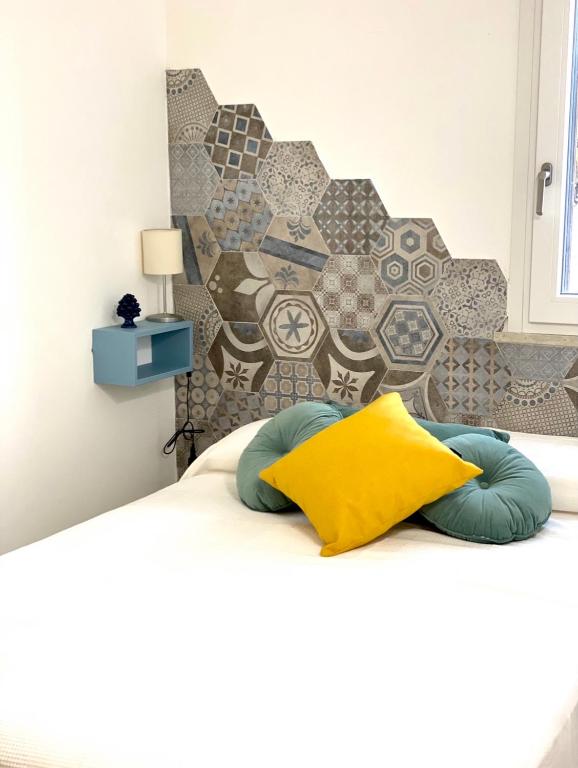 A bed or beds in a room at Casa vacanze Almàsalo