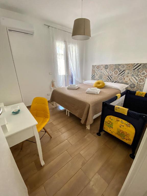 A bed or beds in a room at Casa vacanze Almàsalo