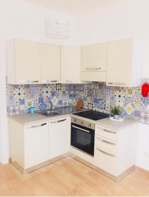 A kitchen or kitchenette at Casa vacanze Almàsalo