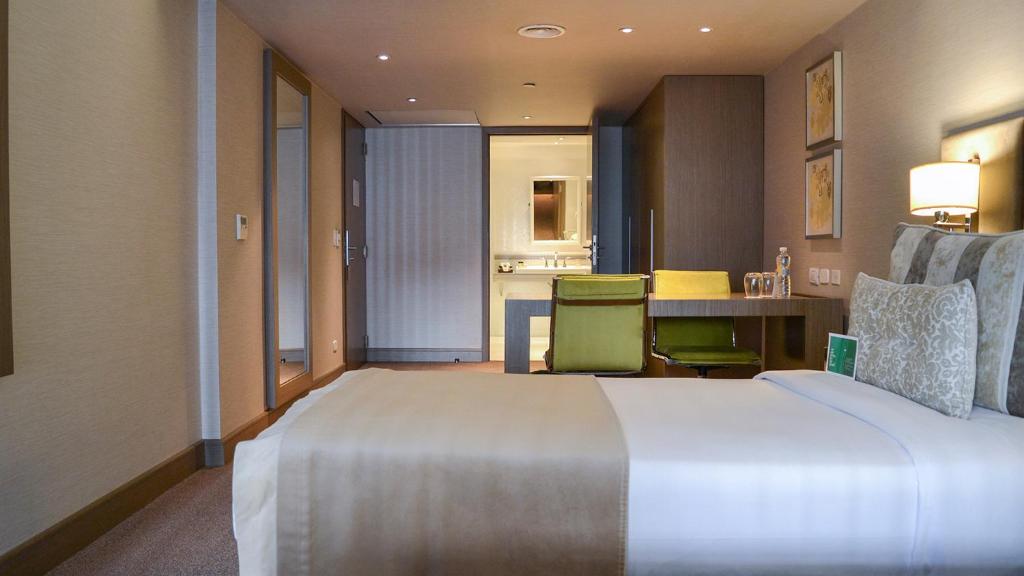 Кровать или кровати в номере Recoleta Grand