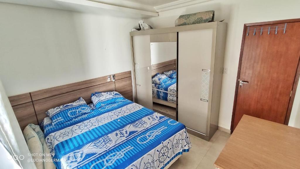 A bed or beds in a room at Apartamento 05 Vivendas do Serrano - Lençóis
