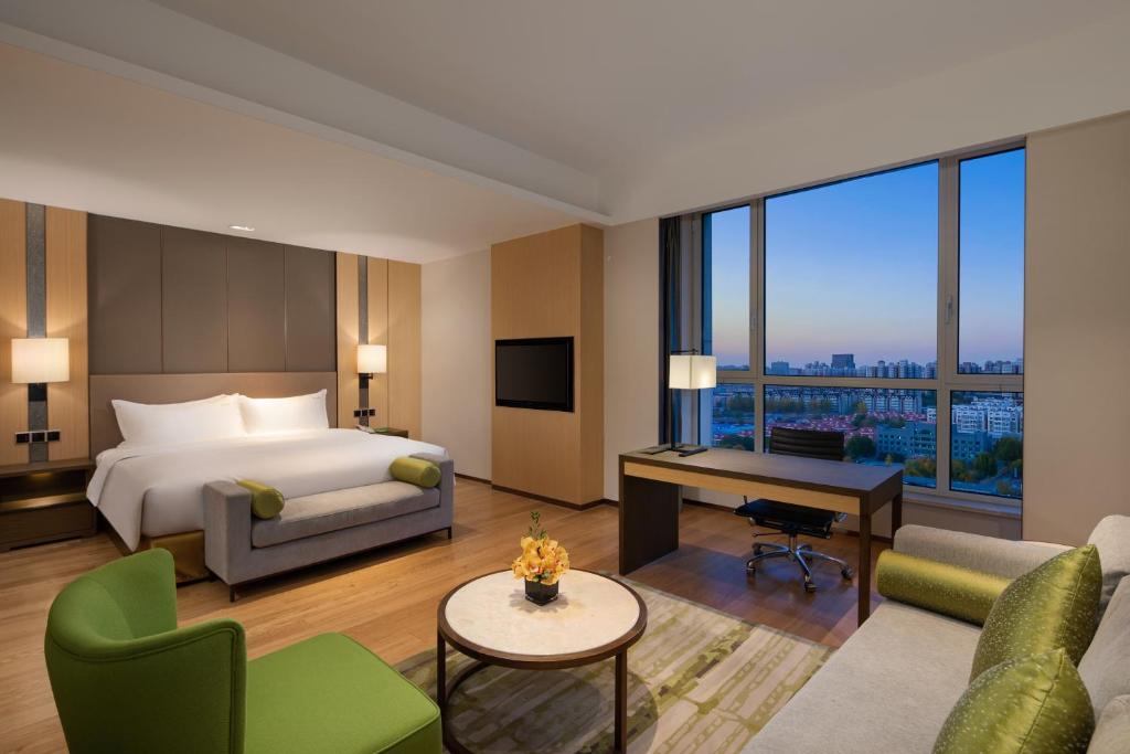 Postel nebo postele na pokoji v ubytování Holiday Inn Express Langfang New Chaoyang by IHG