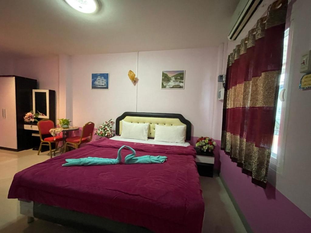 Postel nebo postele na pokoji v ubytování Diamond Resort