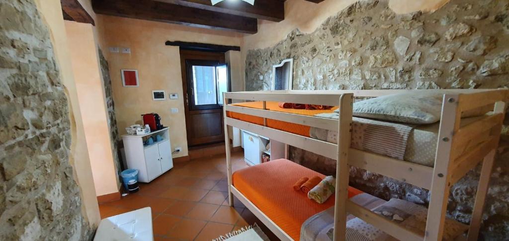 Dviaukštė lova arba lovos apgyvendinimo įstaigoje L'OROLOGIO casa vacanze