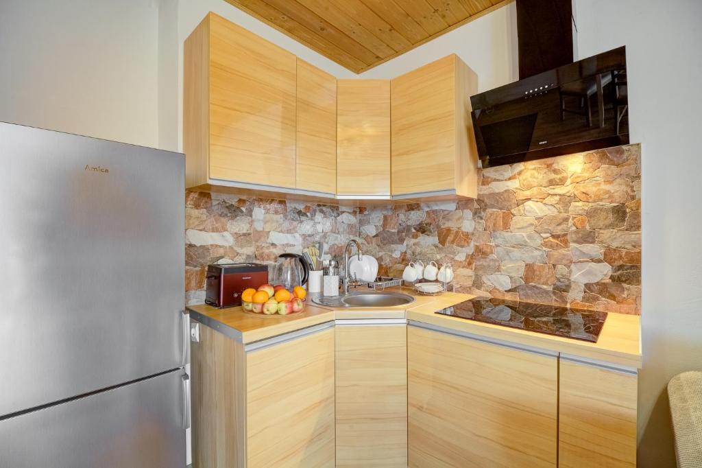 Kuchyň nebo kuchyňský kout v ubytování Apartamenty Szwarcowa