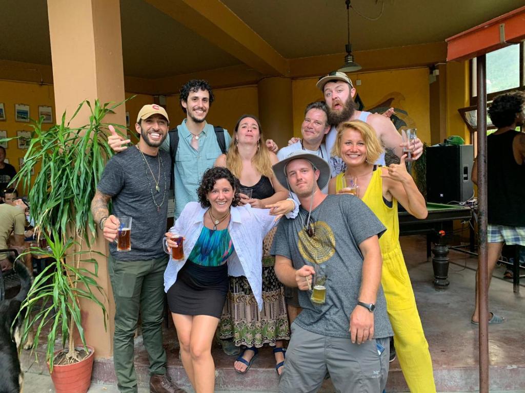 un gruppo di persone che posano per una foto di Lake Vision Guesthouse a Pokhara