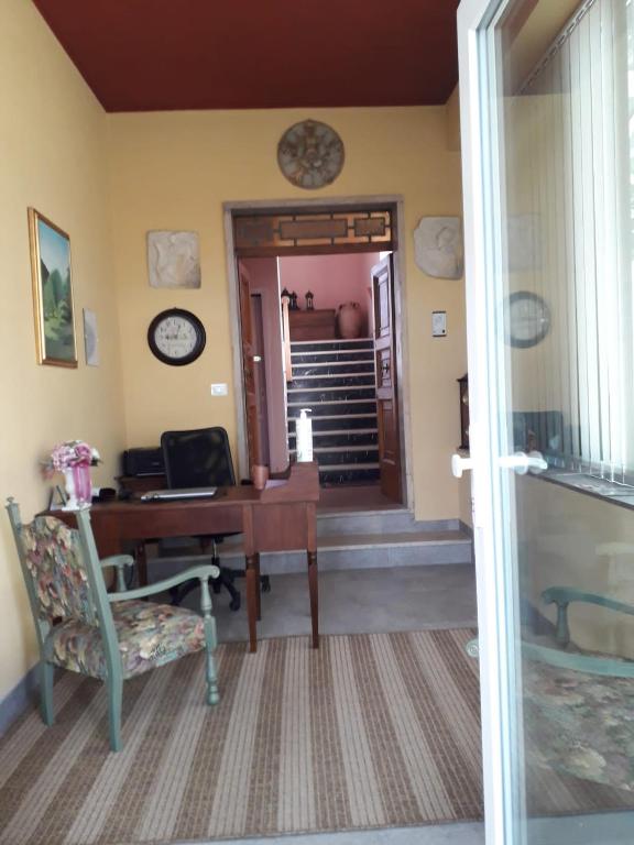 Televízia a/alebo spoločenská miestnosť v ubytovaní Cospea B&B