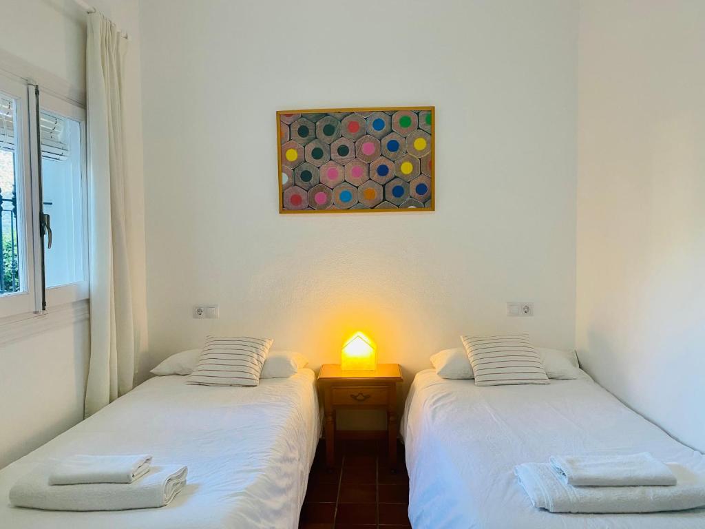 Postel nebo postele na pokoji v ubytování Stay Wild en Las Casitas de Huerta Arriba