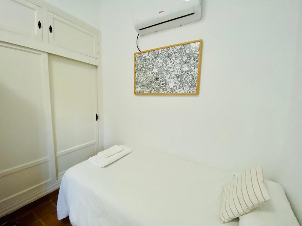 Postel nebo postele na pokoji v ubytování Stay Wild en Las Casitas de Huerta Arriba