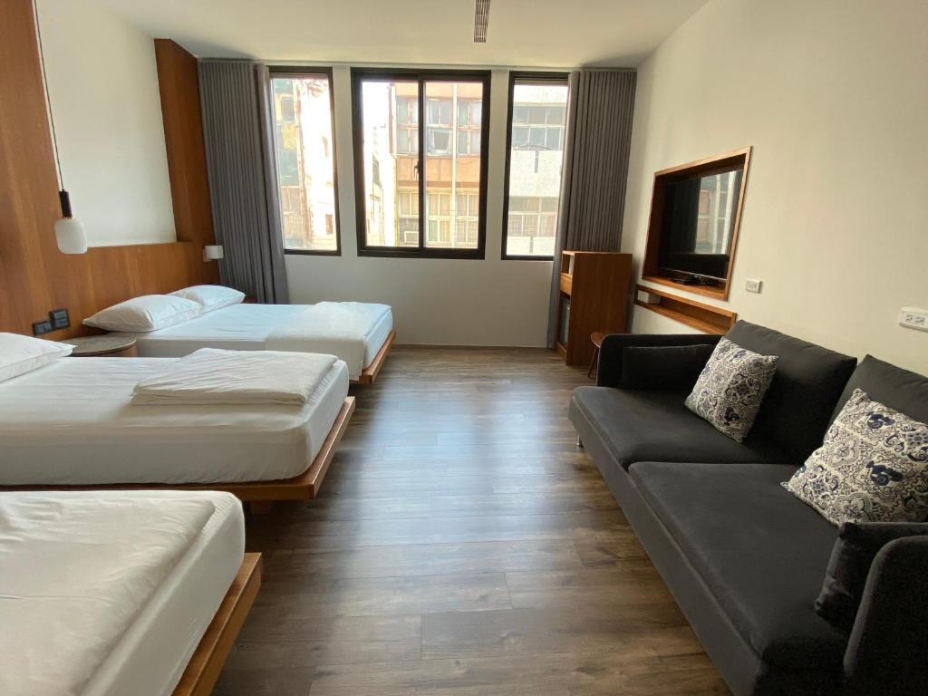 Postel nebo postele na pokoji v ubytování De Provintia Straat B&B
