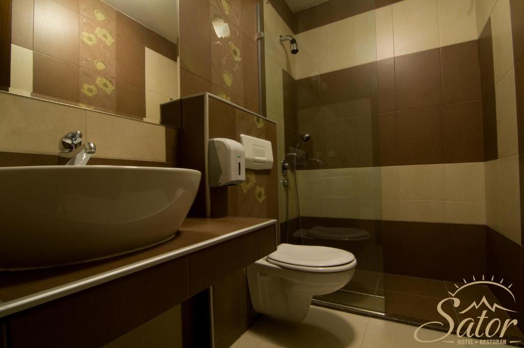 Koupelna v ubytování Hotel Šator
