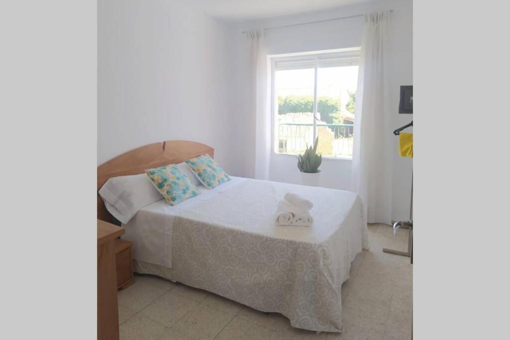 A bed or beds in a room at La casa del pueblo