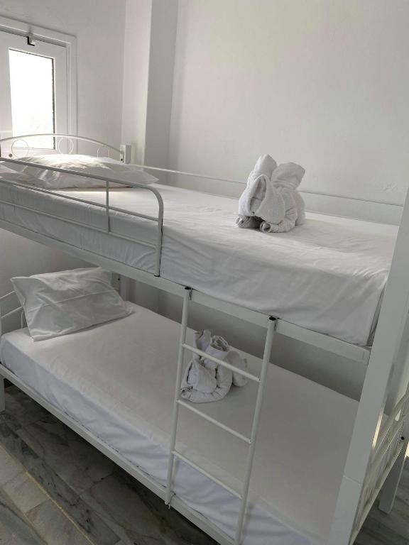 Postel nebo postele na pokoji v ubytování Cactus Beach Paros