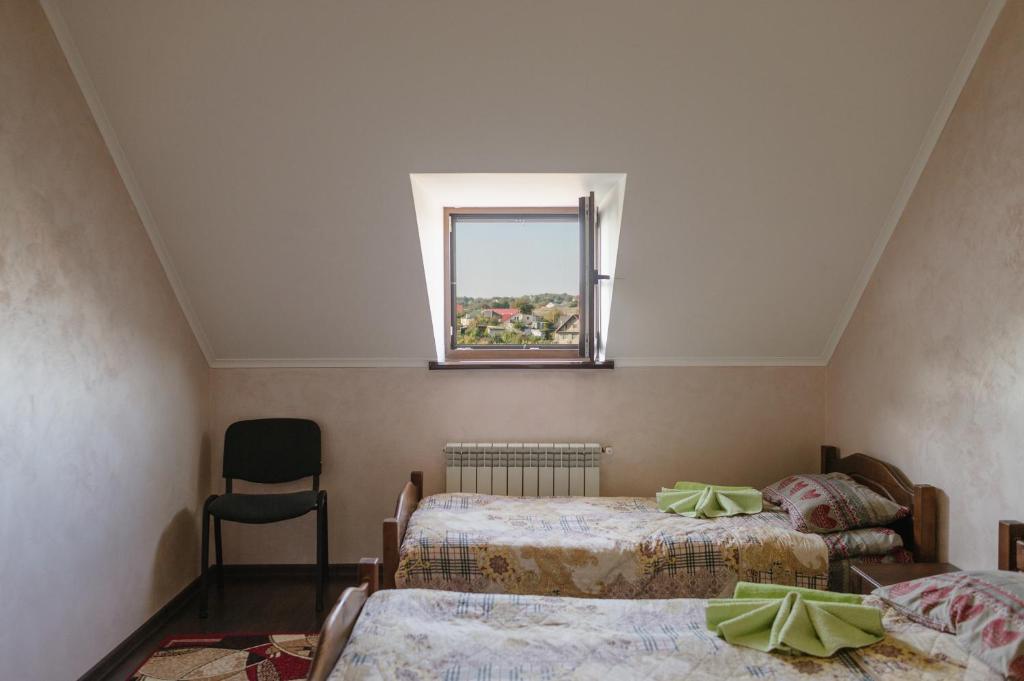 Postel nebo postele na pokoji v ubytování Джерело
