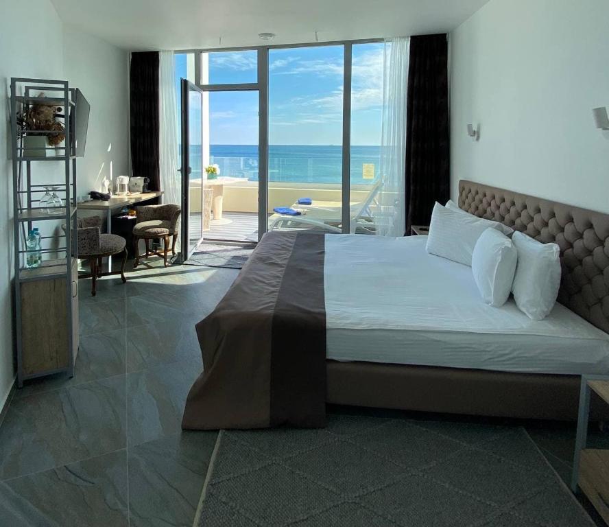 Postel nebo postele na pokoji v ubytování Boutique Hotel Portofino