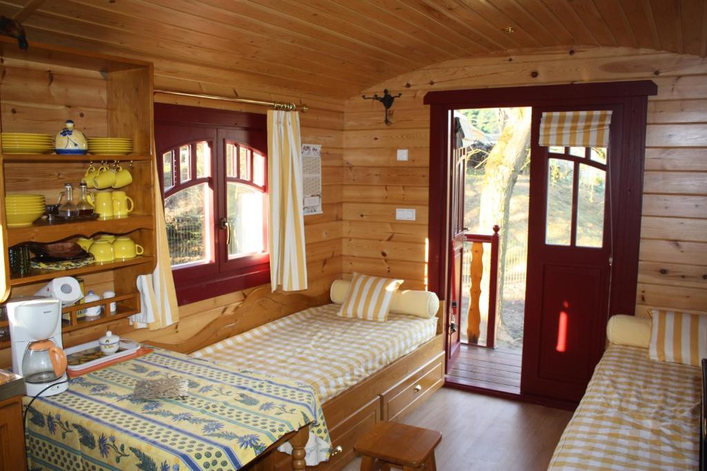 Voodi või voodid majutusasutuse La Gypsy Caravan toas