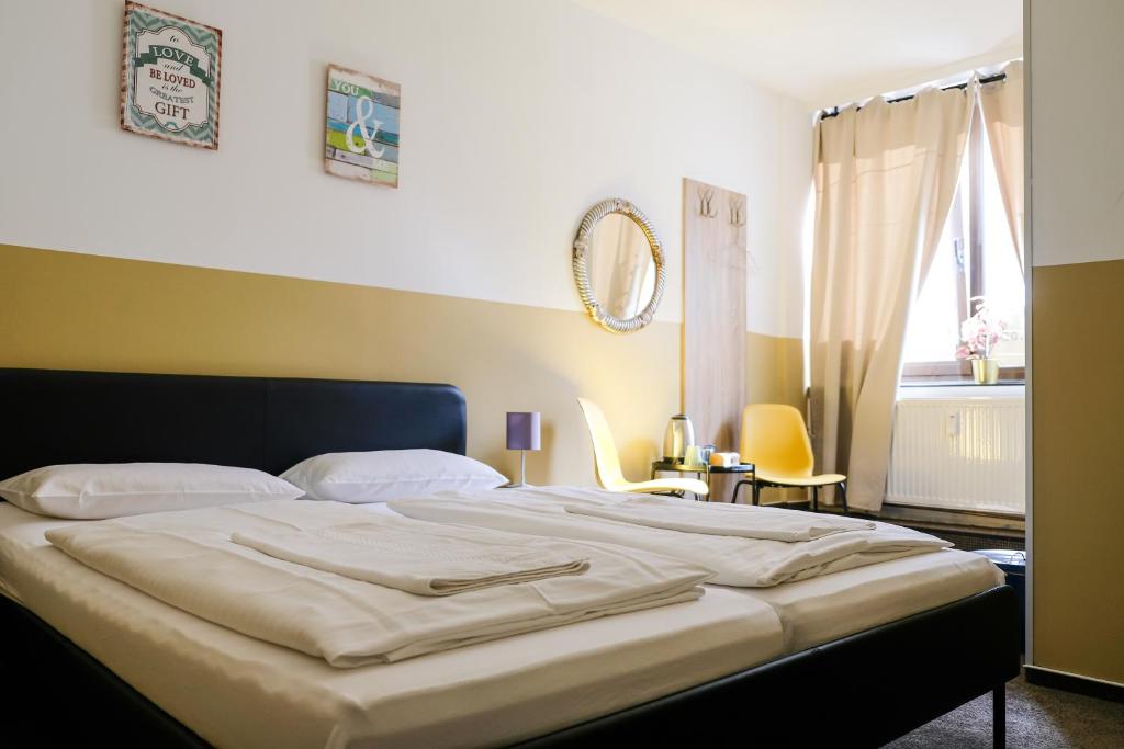 Uma cama ou camas num quarto em Hammerbrook Hostel