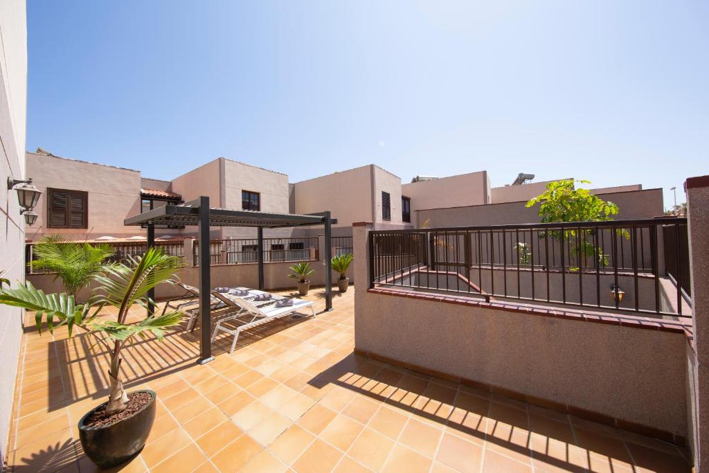Balkón nebo terasa v ubytování MEDANO4YOU The Wing Palace Tenerife