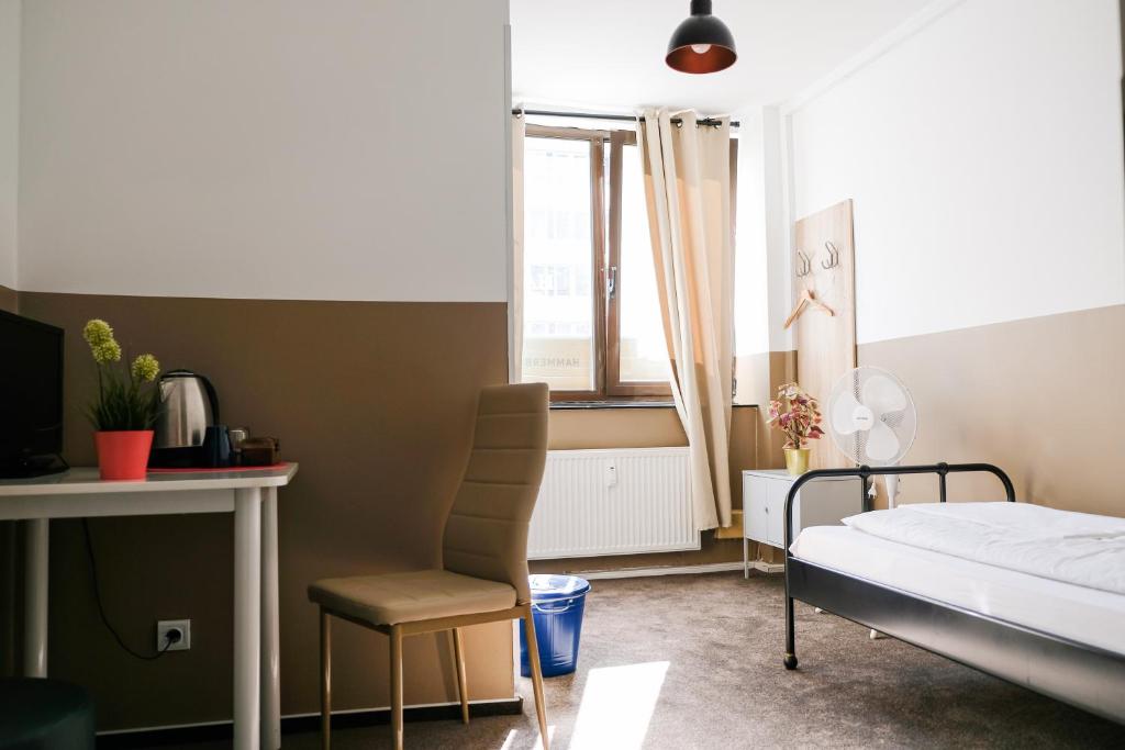 Uma cama ou camas num quarto em Hammerbrook Hostel
