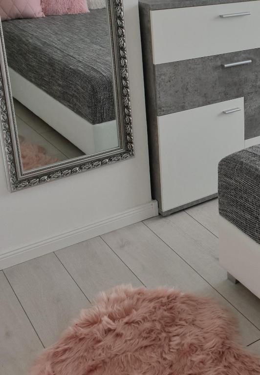 Łóżko lub łóżka w pokoju w obiekcie Best Panoráma Apartman