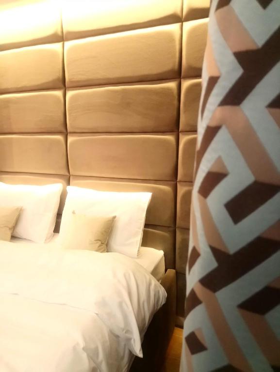 Postel nebo postele na pokoji v ubytování Residente Centr Apart-Hotel