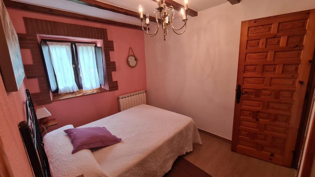 Postel nebo postele na pokoji v ubytování El BurbyI