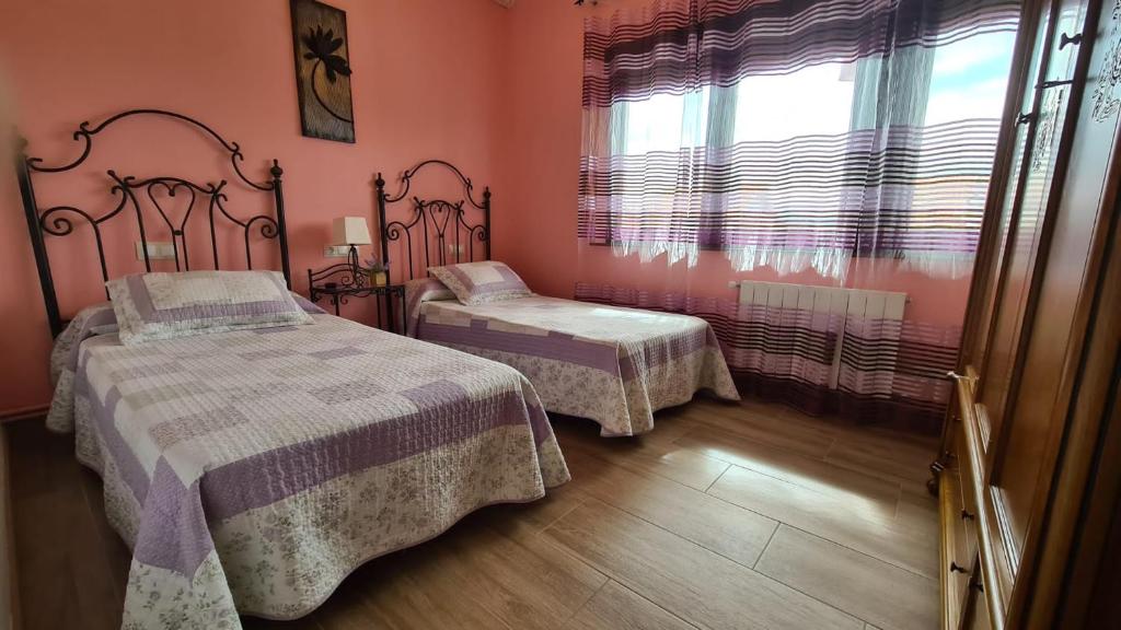 Postel nebo postele na pokoji v ubytování El BurbyI
