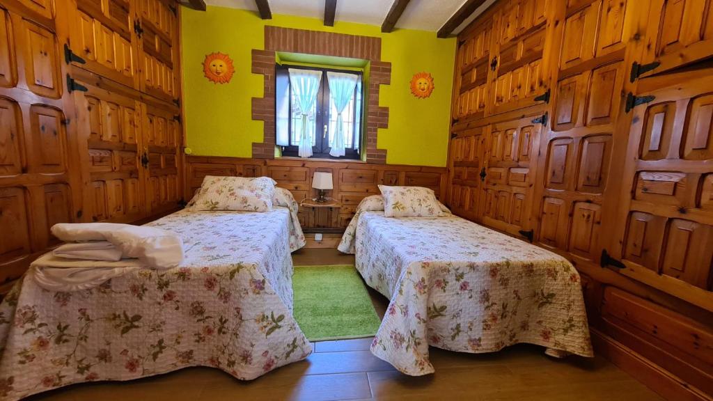 Postel nebo postele na pokoji v ubytování El BurbyI